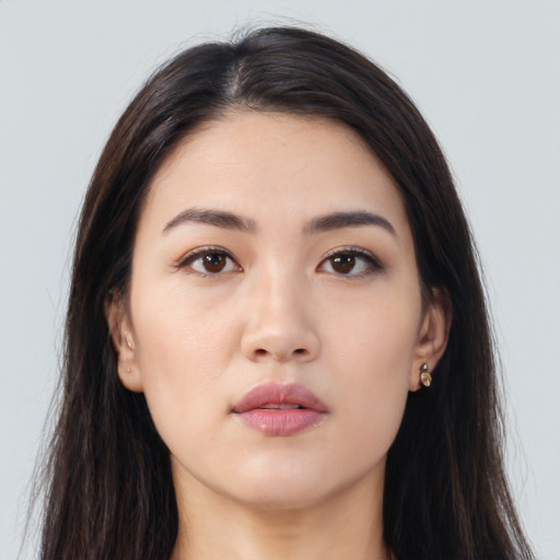 Neutral asian young-adult female with long  brown hair and brown eyes