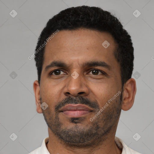 Neutral latino adult male with short  black hair and brown eyes