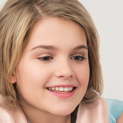 Joyful white child female with long  brown hair and brown eyes