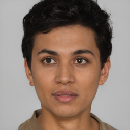 Neutral latino young-adult male with short  black hair and brown eyes