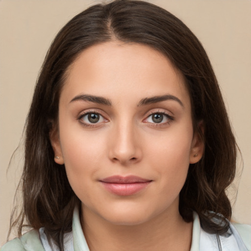 Neutral white young-adult female with medium  brown hair and brown eyes