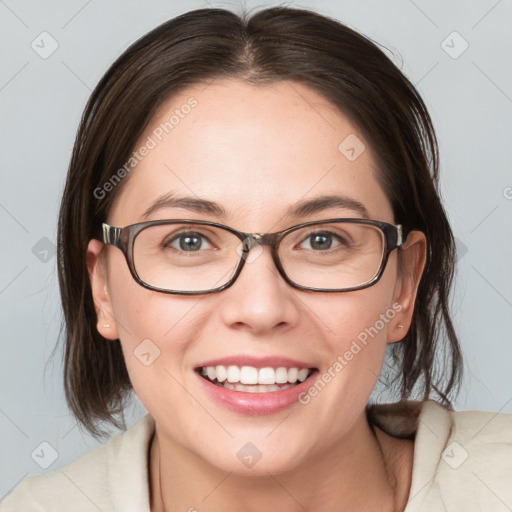 Joyful white young-adult female with medium  brown hair and blue eyes