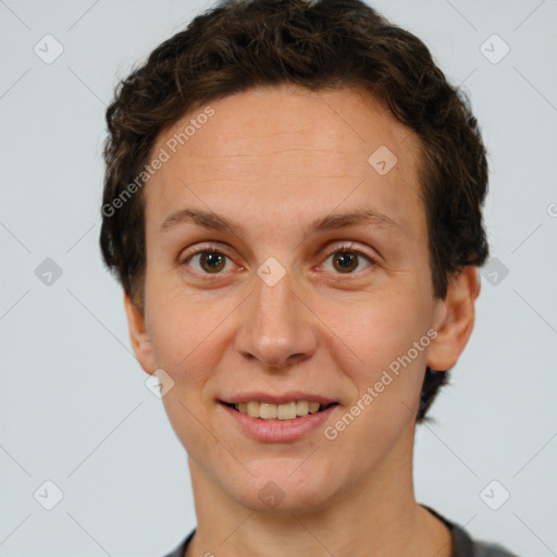 Joyful white adult female with short  brown hair and brown eyes