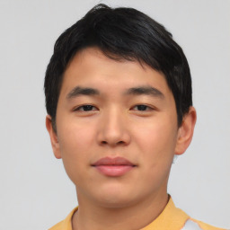 Neutral asian young-adult male with short  brown hair and brown eyes