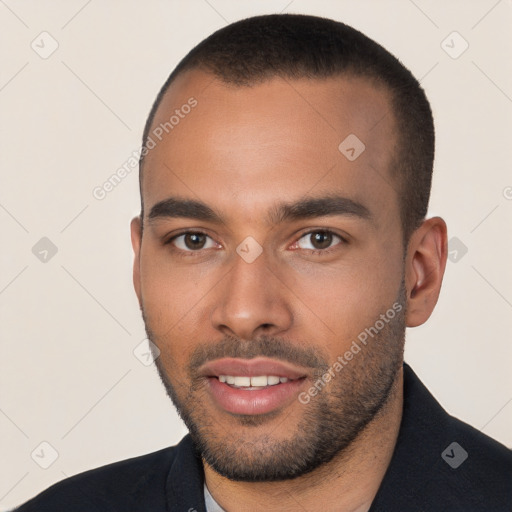 Joyful white young-adult male with short  black hair and brown eyes