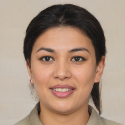 Joyful asian young-adult female with medium  brown hair and brown eyes