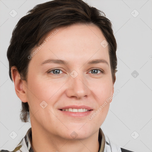 Joyful white young-adult female with short  brown hair and grey eyes