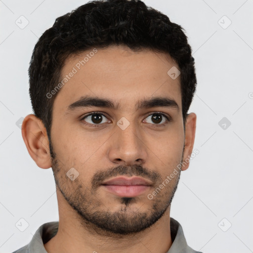 Neutral latino young-adult male with short  black hair and brown eyes