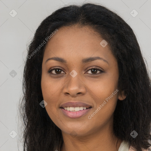 Joyful black young-adult female with long  brown hair and brown eyes