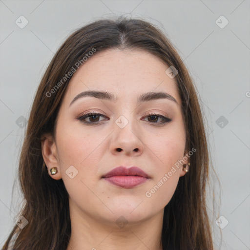 Neutral white young-adult female with long  brown hair and brown eyes