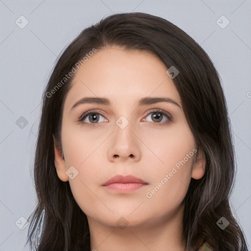 Neutral white young-adult female with long  brown hair and brown eyes