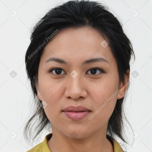 Joyful asian young-adult female with medium  brown hair and brown eyes