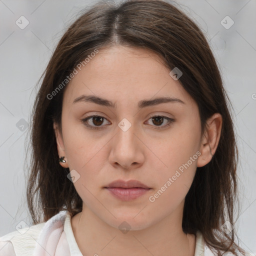 Neutral white young-adult female with medium  brown hair and brown eyes