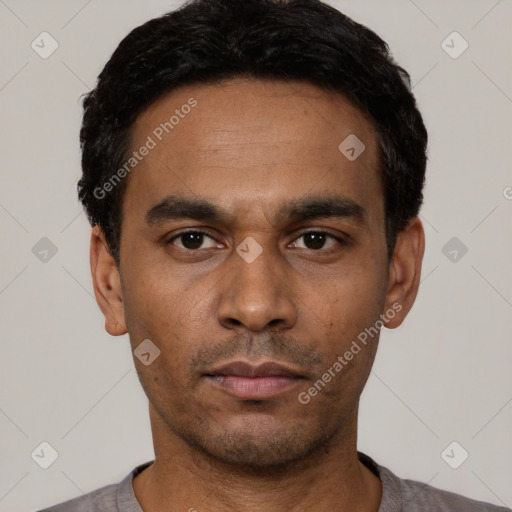 Neutral latino young-adult male with short  black hair and brown eyes