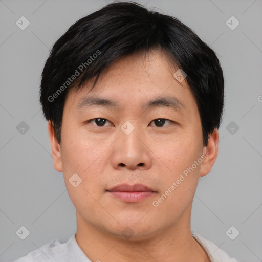 Neutral asian young-adult male with short  black hair and brown eyes