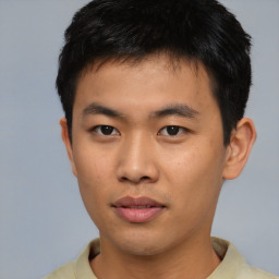 Neutral asian young-adult male with short  black hair and brown eyes