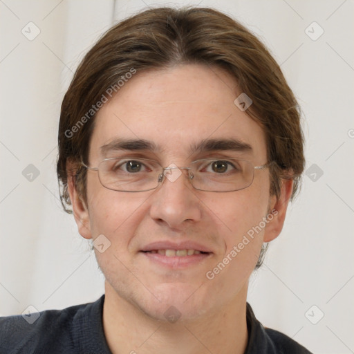 Joyful white adult male with short  brown hair and grey eyes