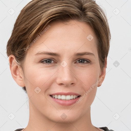 Joyful white young-adult female with short  brown hair and grey eyes