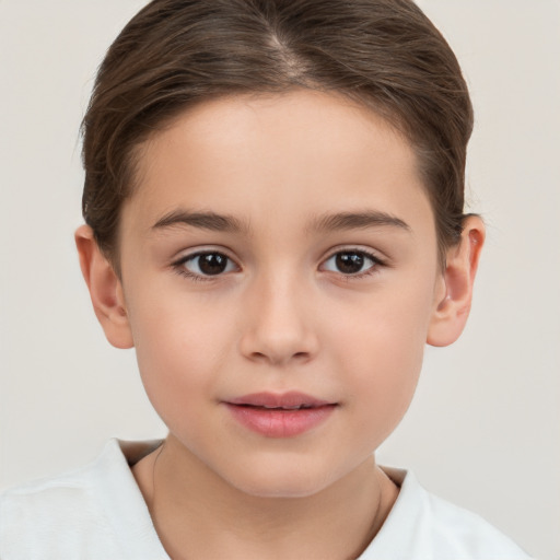 Joyful white child female with short  brown hair and brown eyes