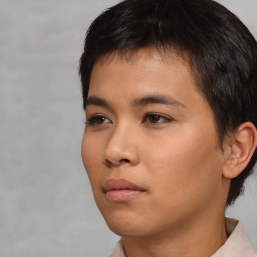 Neutral white young-adult male with short  black hair and brown eyes