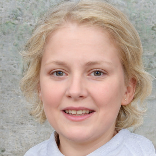 Joyful white young-adult female with medium  blond hair and blue eyes