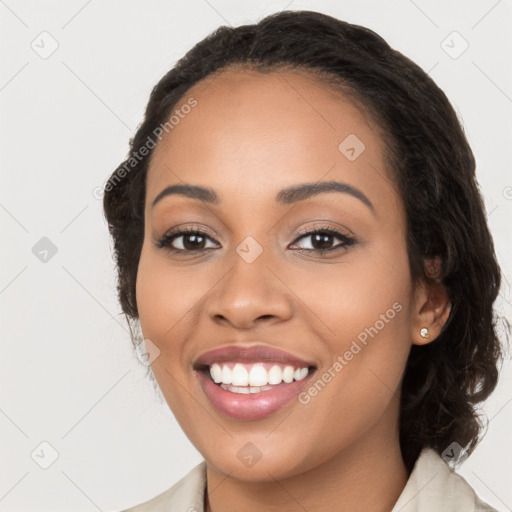 Joyful latino young-adult female with long  black hair and brown eyes