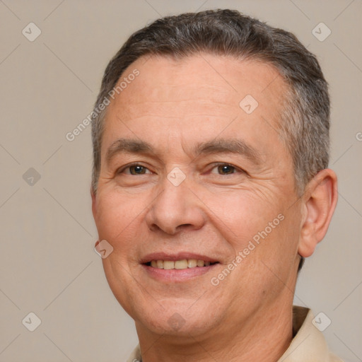 Joyful white adult male with short  brown hair and brown eyes