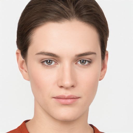 Neutral white young-adult female with short  brown hair and brown eyes