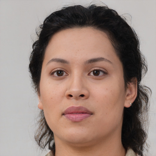 Neutral latino young-adult female with medium  brown hair and brown eyes