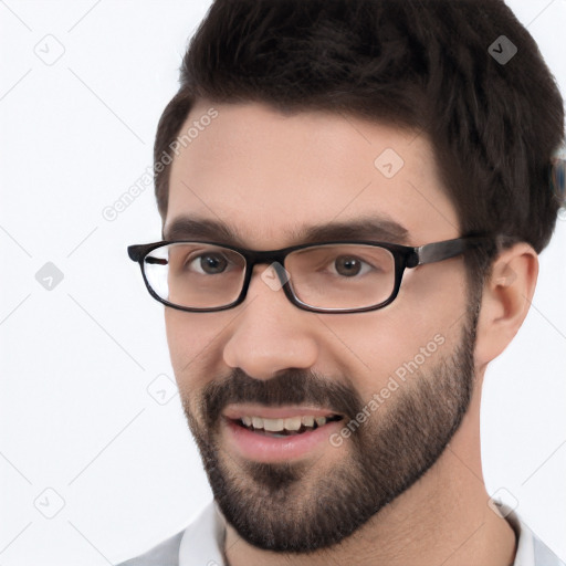 Joyful white young-adult male with short  black hair and brown eyes