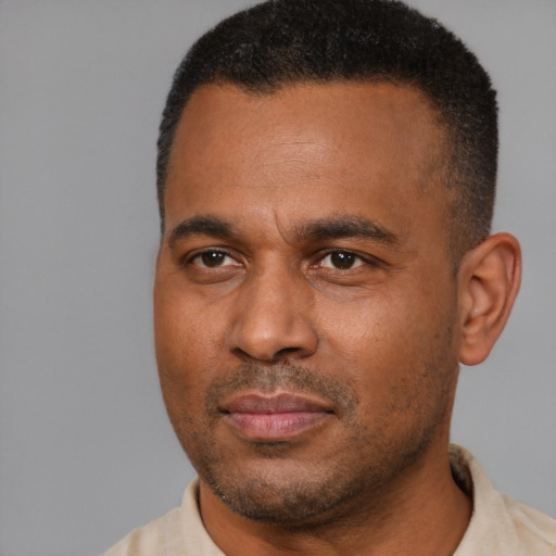 Neutral latino young-adult male with short  brown hair and brown eyes