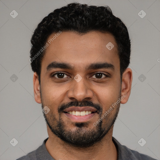 Joyful latino young-adult male with short  black hair and brown eyes