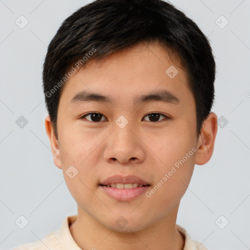 Joyful asian young-adult male with short  brown hair and brown eyes