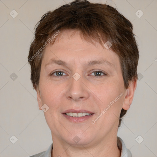 Joyful white adult female with short  brown hair and brown eyes