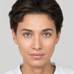 Neutral white young-adult female with short  brown hair and brown eyes