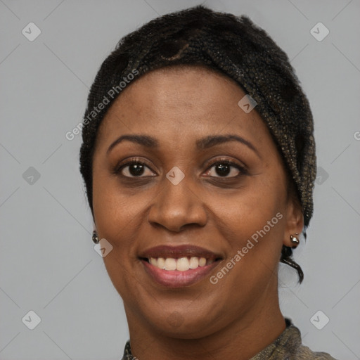 Joyful black adult female with short  brown hair and brown eyes
