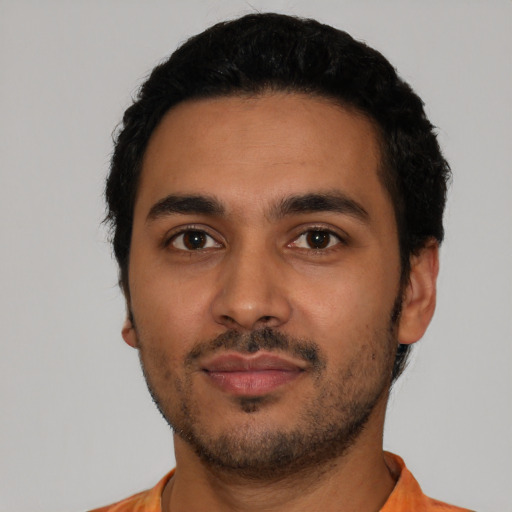 Neutral latino young-adult male with short  black hair and brown eyes