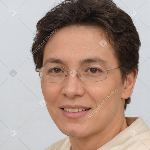 Joyful white adult female with short  brown hair and brown eyes