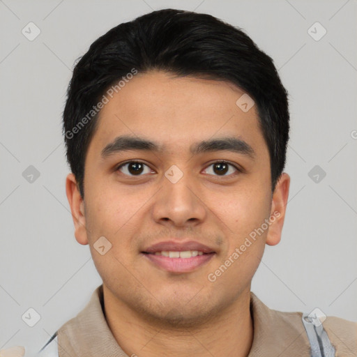 Joyful asian young-adult male with short  black hair and brown eyes