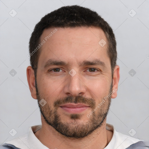 Joyful white adult male with short  brown hair and brown eyes