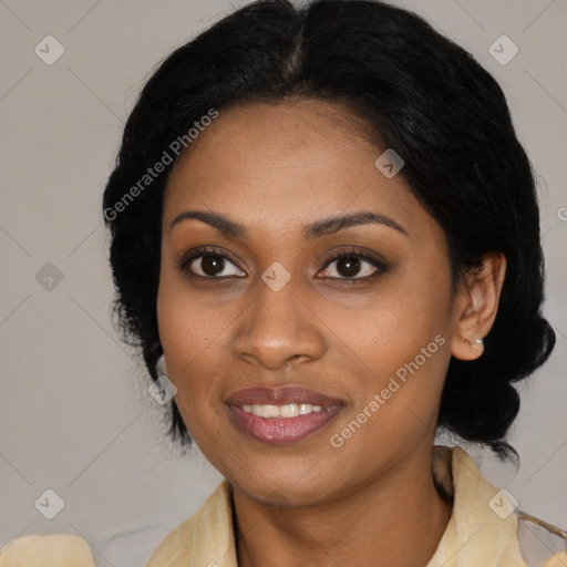 Joyful black young-adult female with medium  black hair and brown eyes