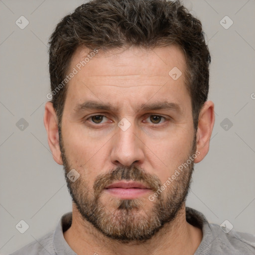 Neutral white adult male with short  brown hair and brown eyes