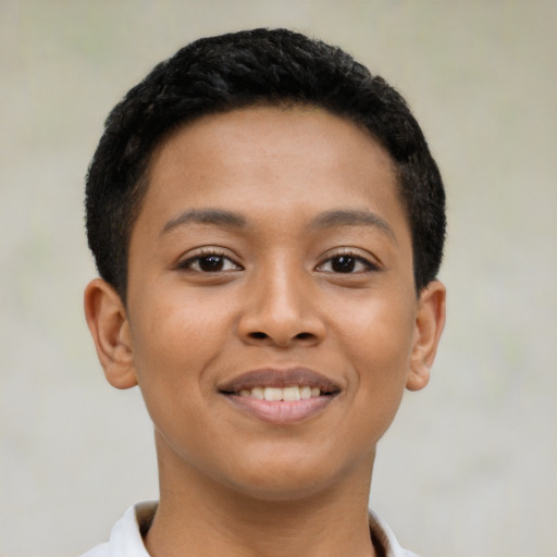 Joyful latino young-adult female with short  brown hair and brown eyes