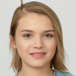 Joyful white young-adult female with medium  brown hair and green eyes