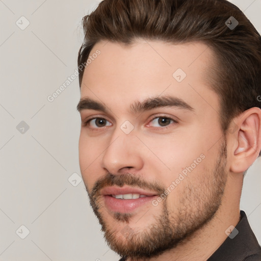 Joyful white young-adult male with short  brown hair and brown eyes