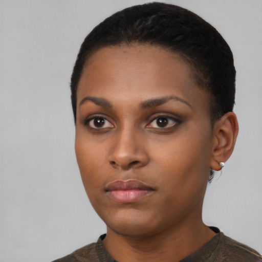 Neutral black young-adult female with short  black hair and brown eyes