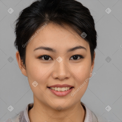 Joyful asian young-adult female with short  brown hair and brown eyes