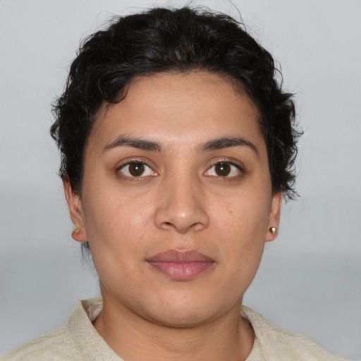 Neutral latino young-adult female with short  brown hair and brown eyes