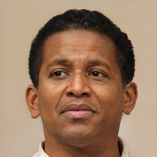 Neutral latino adult male with short  brown hair and brown eyes