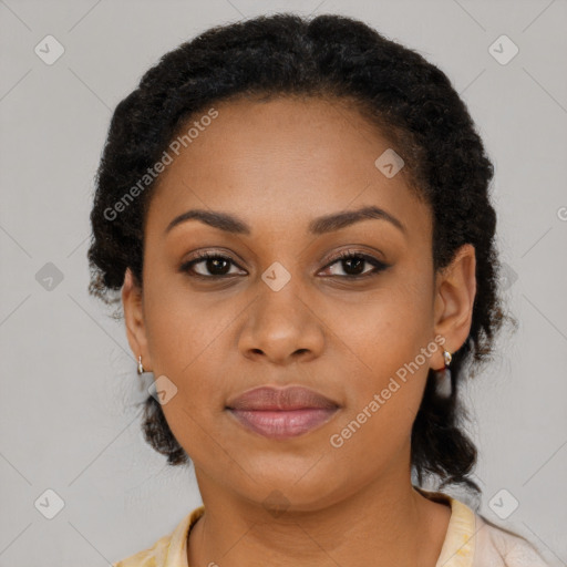 Joyful black young-adult female with long  brown hair and brown eyes